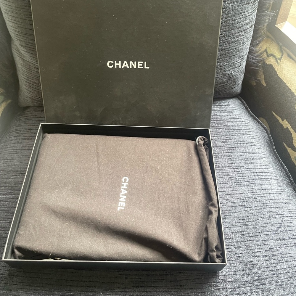 Brand new Chanel clutch. Never used. Box and tag stand dust bag included